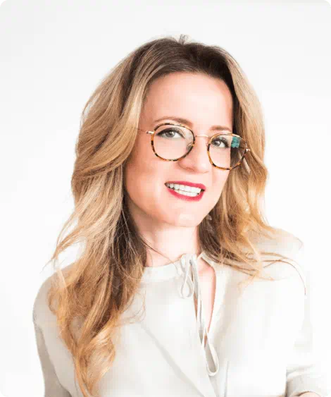 Picture of a smiling man wearing a suit.