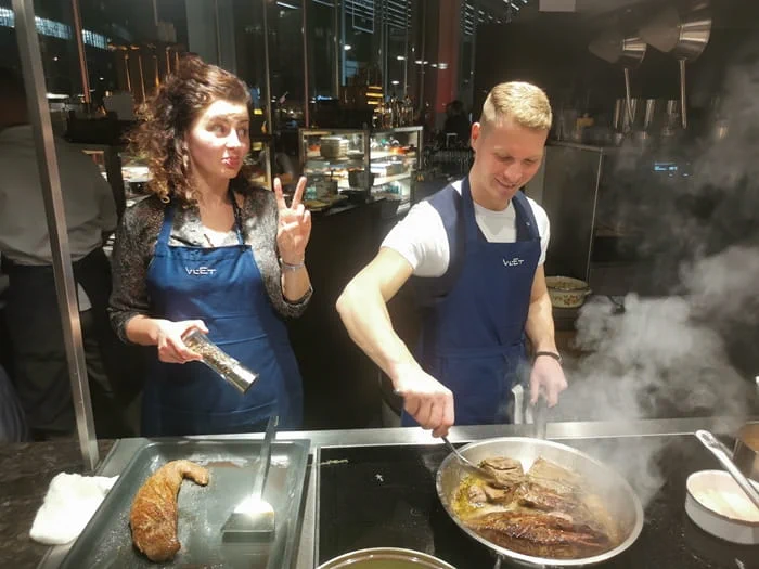 Two colleagues at a team cooking event