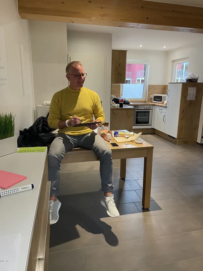 Colleague sitting at a desk in the Canvas Reply office